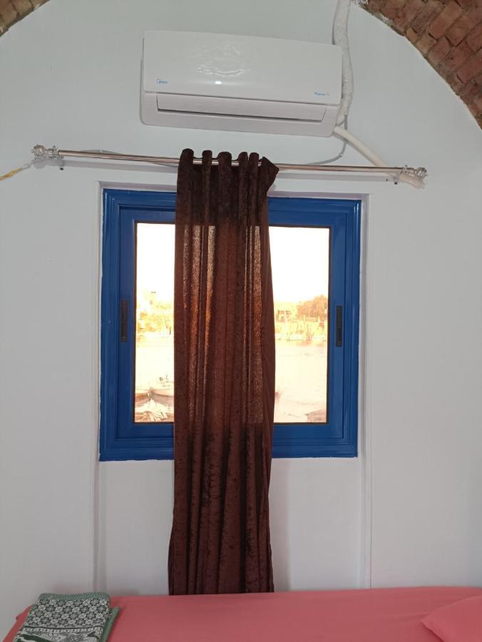 Bakar Guest House Aswan Bagian luar foto